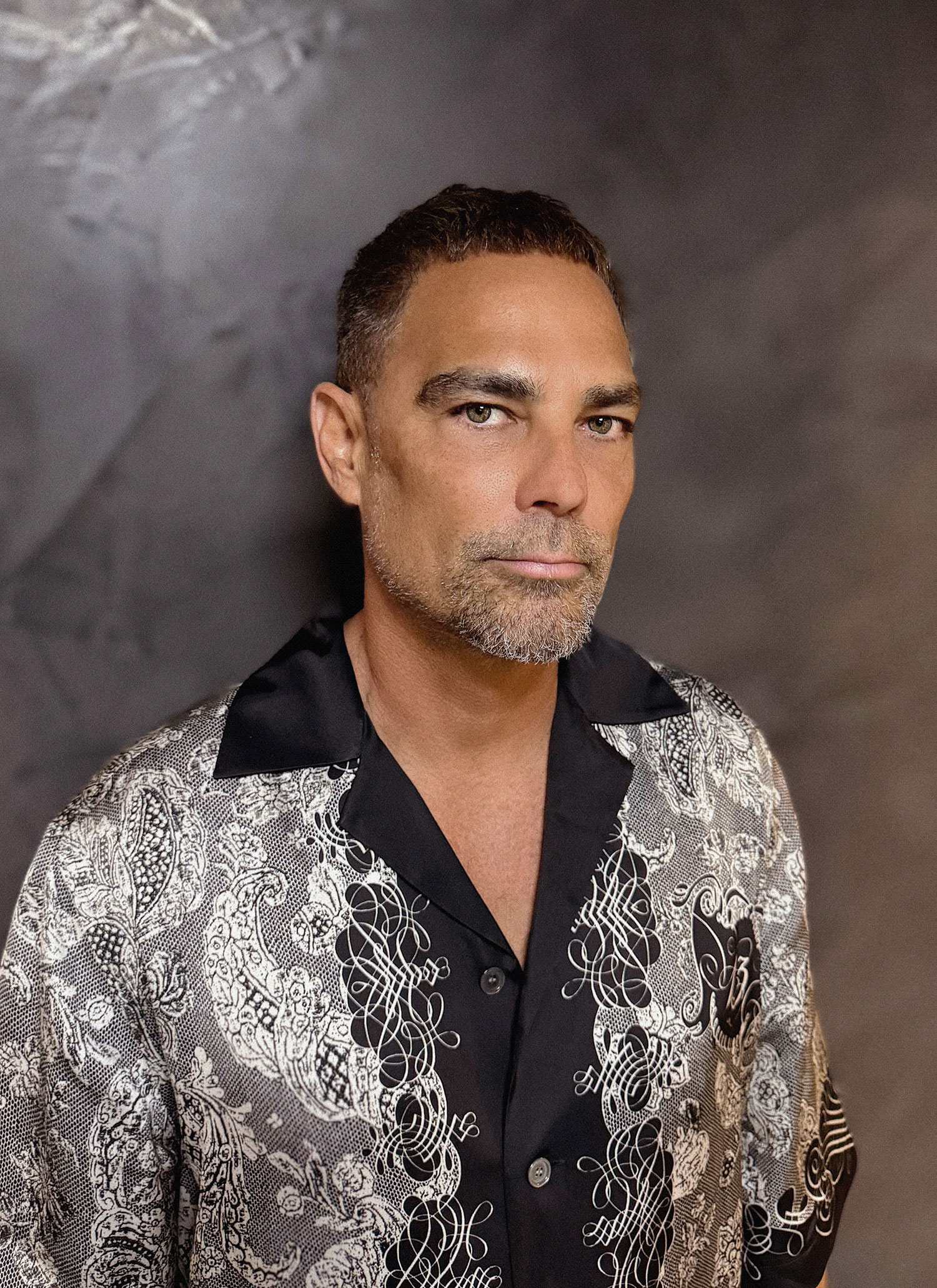 A headshot of Michael Cook.