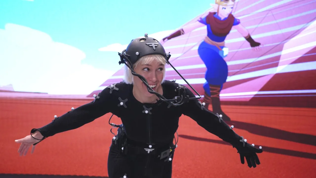 Sally Coleman in a motion capture suit used to animate Taal. Credit: Big Sand, Brecon James