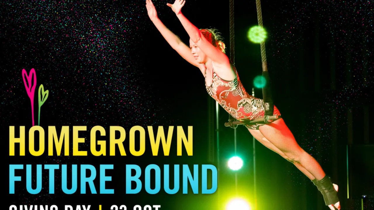 Girl on trapeze doing a trick. Text says: "Homegrown, Future Bound. Giving Day, 23 Oct". Flipside Circus. Photographer is Creative Futures Photography.