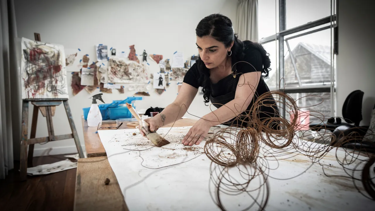 Artist Negin Chahoud creating work during her artist residency at Bundanon. Photo by Paul Jones, 2024.