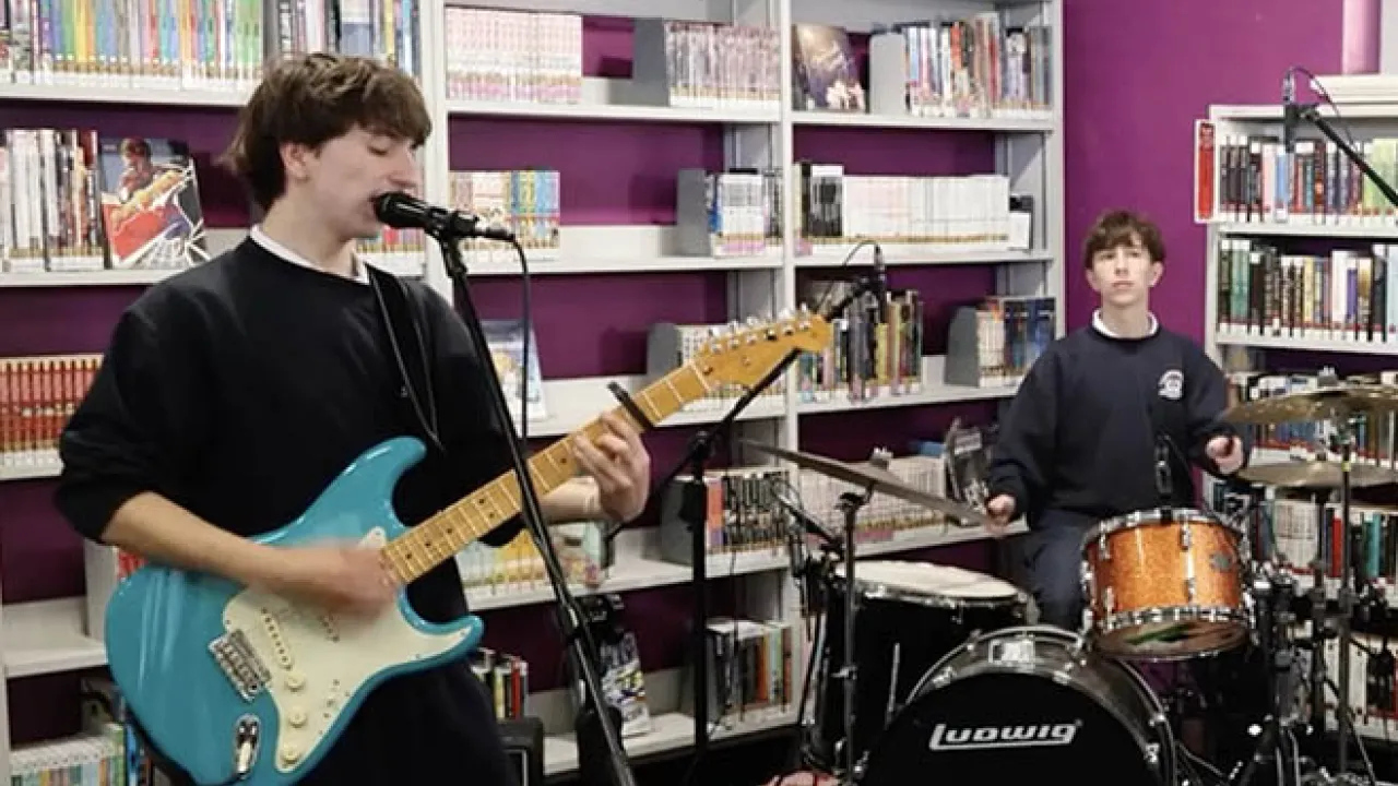 Band playing in a high school library