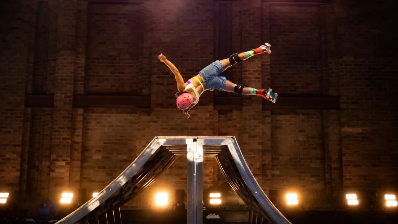 Tia Pittman flips over a skate ramp
