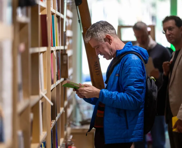 Man browsing books at a book store