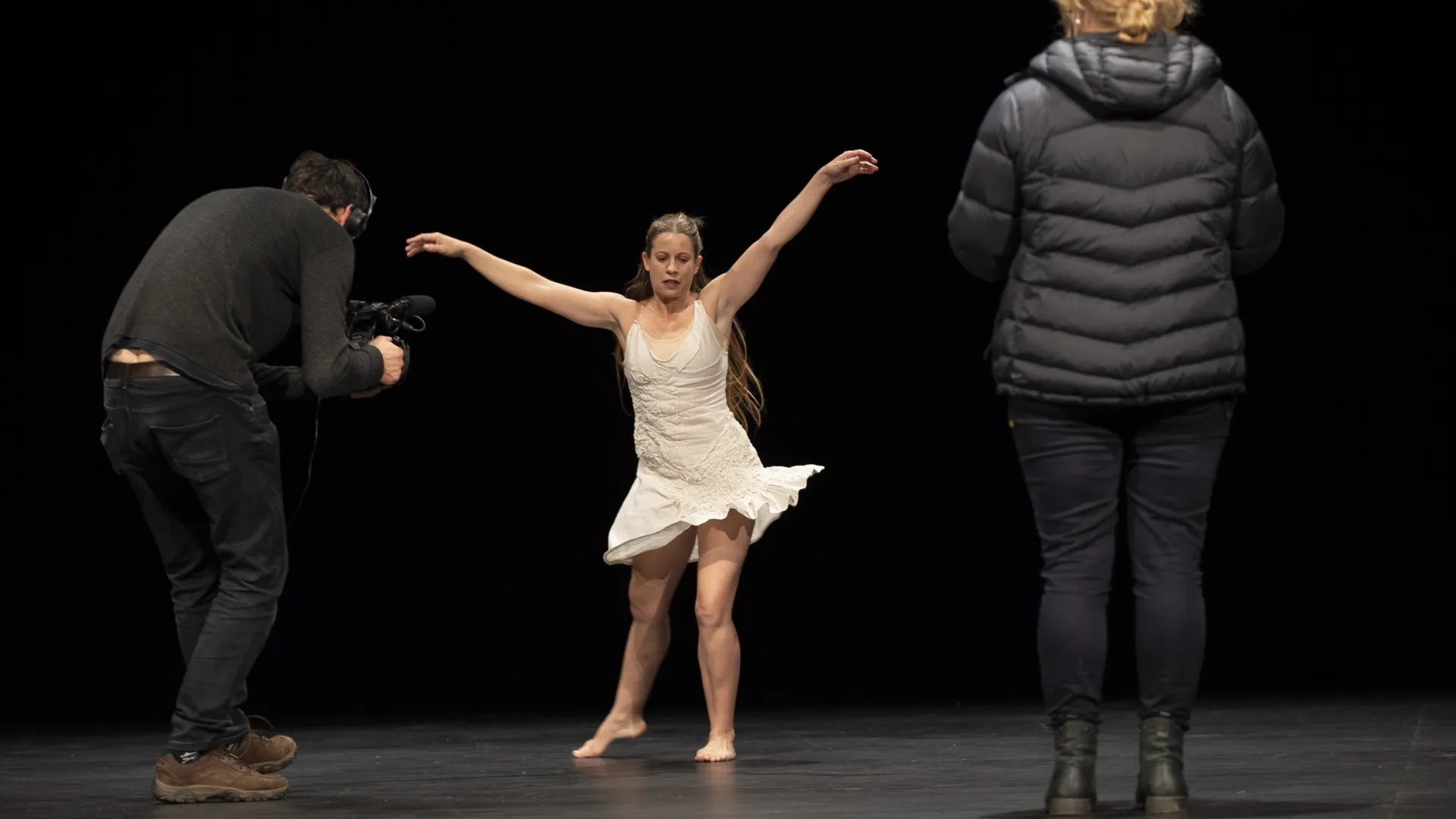 Behind the scenes photo of dancer Floeur, filmmaker Dawn and cinematographer Sam.